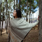 Jacquard poncho with sleeve