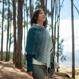 Jacquard poncho with sleeve
